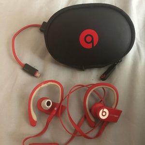 Red wireless beats with case and charger